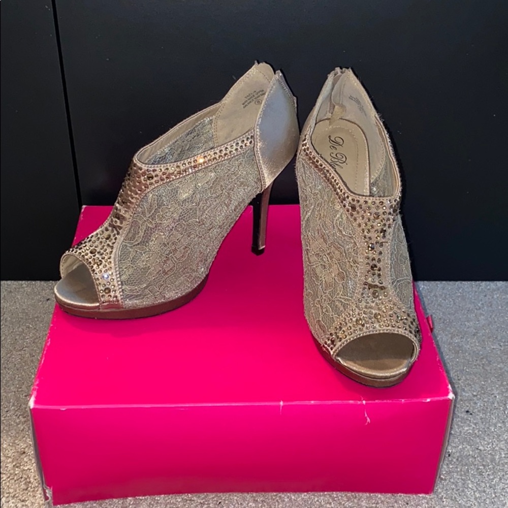 Lace and gemmed open toed heels
